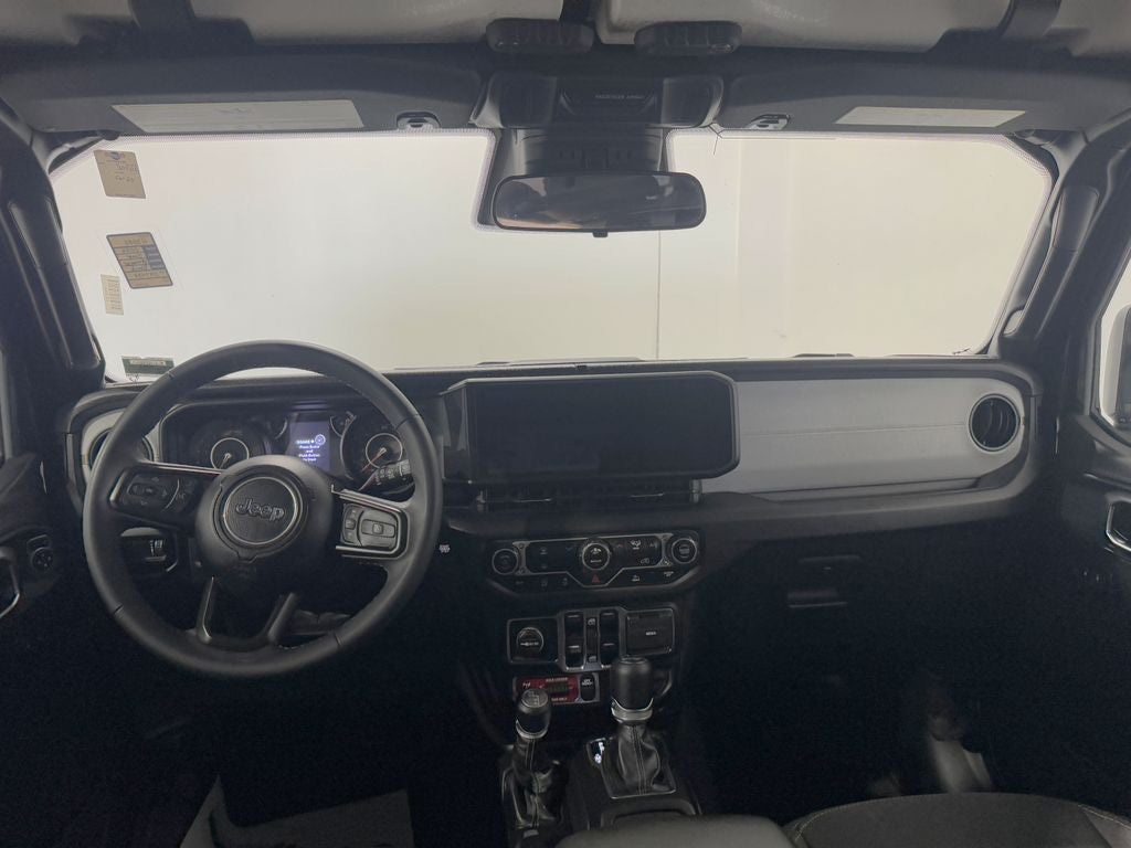 Used 2025 Jeep Wrangler 4-Door Willys with VIN 1C4PJXDN6SW597438 for sale in Kansas City