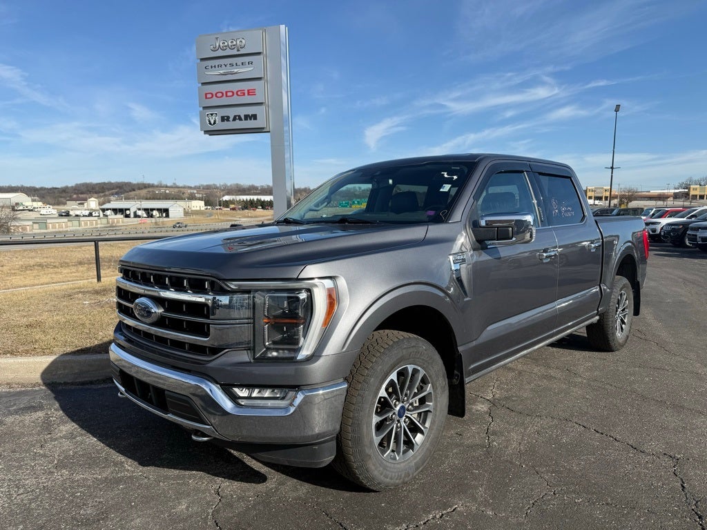 Used 2021 Ford F-150 Lariat with VIN 1FTFW1E89MFB57610 for sale in Kansas City