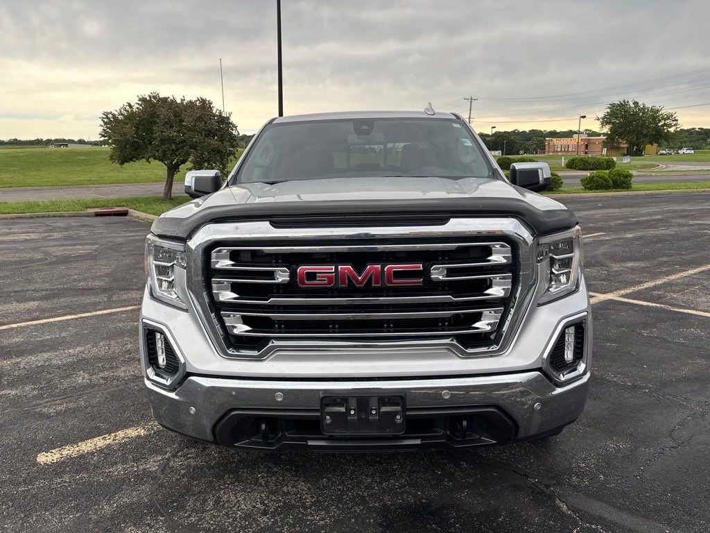 Used 2021 GMC Sierra 1500 SLT with VIN 3GTU9DEL2MG129313 for sale in Kansas City